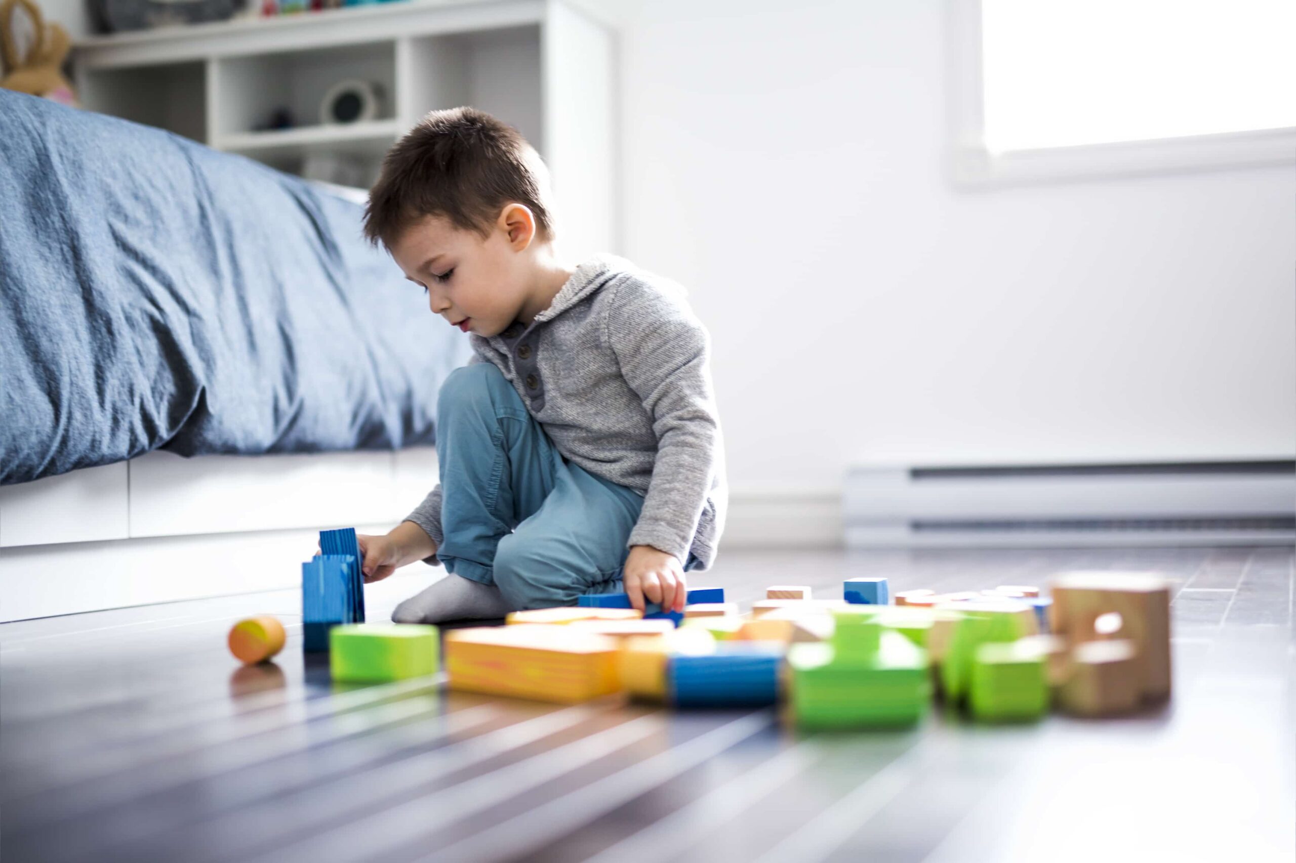 child playing on the floor. Family lawyers Parramatta